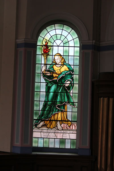 The 'Liberty' window, gallery level, to the left of the organ.   The 'Truth' window sits on the opposite side.